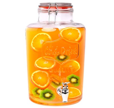Servicio de zumo de naranja natural en dispensador